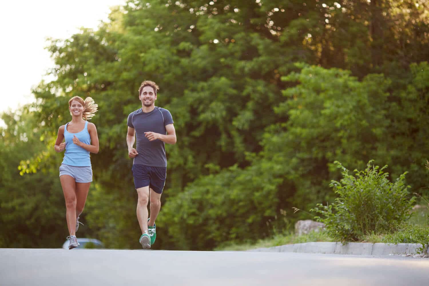 two people running on a road two people on hiking trails near Coppercrest, all age, mobile homes for sale layton coppercrest-residents-in-layton-ut-11